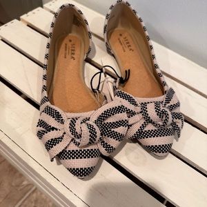 Women's navy and cream flats
